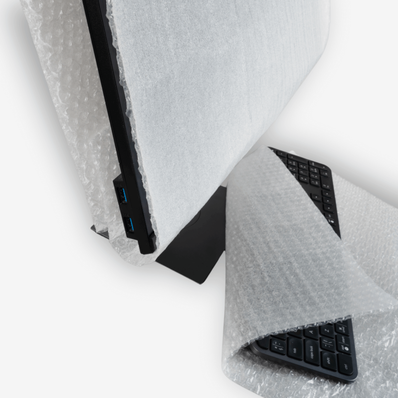 Laminat aus PE-Schaum 0,8 mm und Luftpolsterfolie, 120 cm x 50 lfm – im Einsatz beim Einwickeln von Produkten