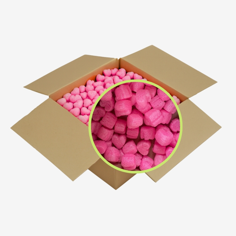 Nahaufnahme des neonrosa, biologisch abbaubaren Skropaks - Füllmaterial für Pakete in Herzform.