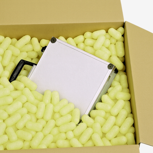 Karton gefüllt mit gelbem Skropak zum Schutz des verpackten Geräts.
